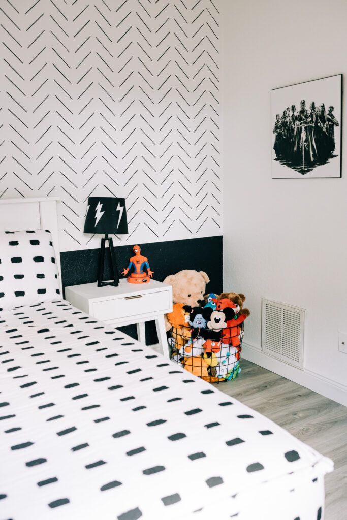 #boysbedroom #superherobedroom #modernsuperhero #colorblock A modern boho color block wall in our son's superhero themed bedroom includes floating wall shelves, a puck light hack within a pendent light and other fun elements.