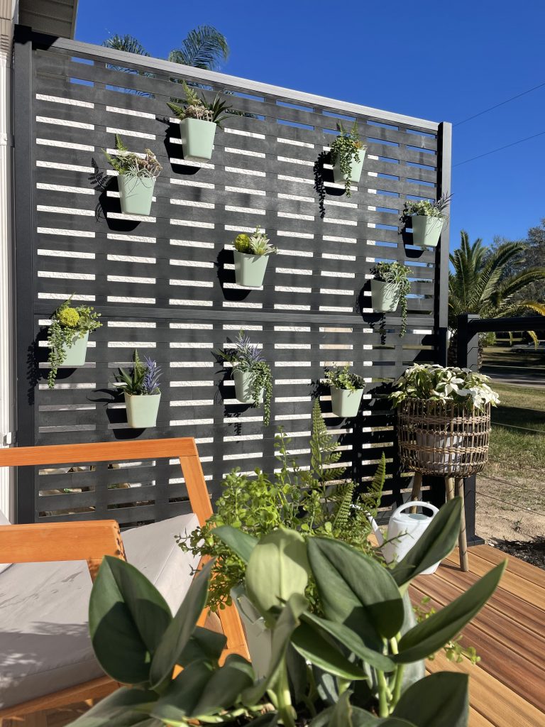 faux plant arrangement; succulents; curb appeal; diy faux plant wall