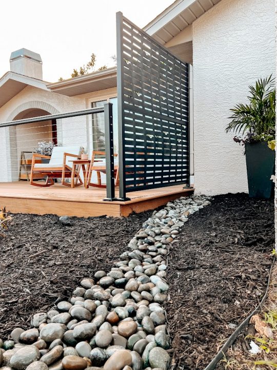 diy downspout drainage solution; dry river bed landscaping