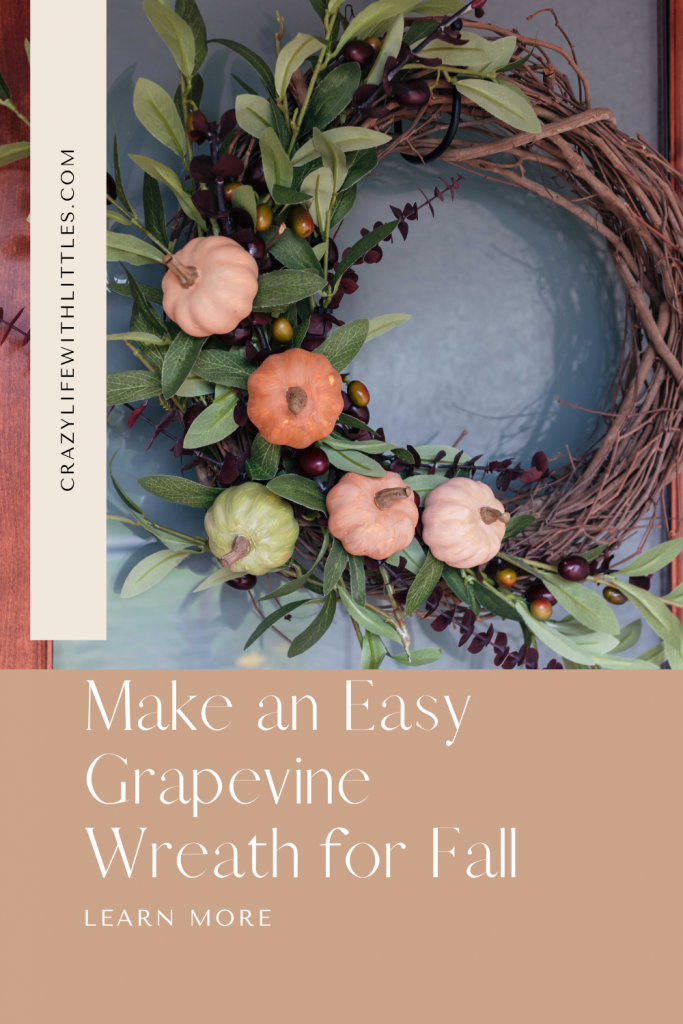 diy fall grapevine wreath with olive stems and mini pumpkins